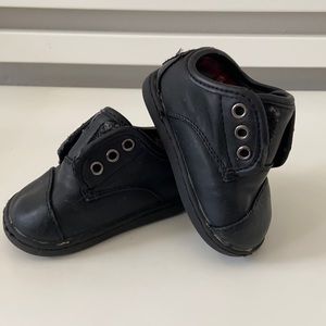 Tom’s high top sneakers